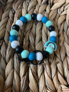 Teal rainbow wristlet