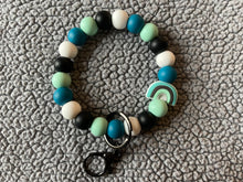 Load image into Gallery viewer, Teal rainbow wristlet
