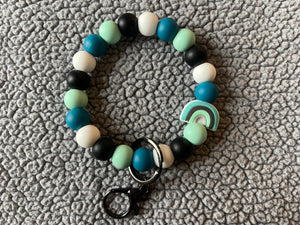 Teal rainbow wristlet