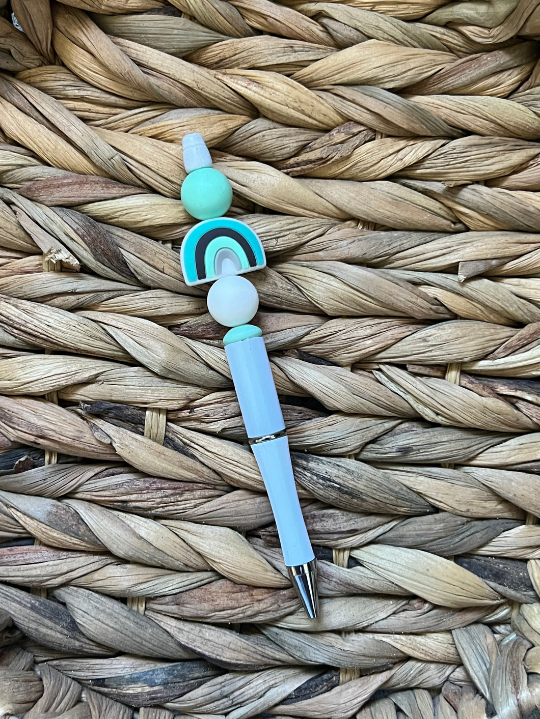 Teal rainbow pen